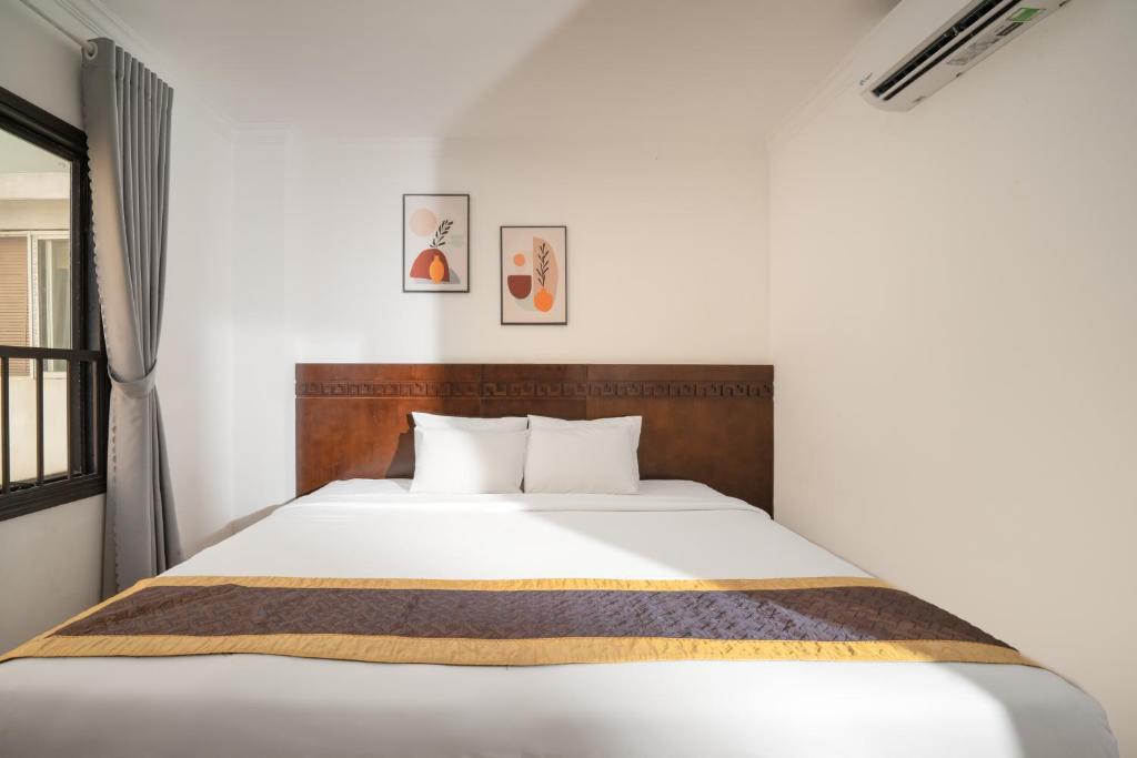 Postel nebo postele na pokoji v ubytování Zenta Sea View Hotel