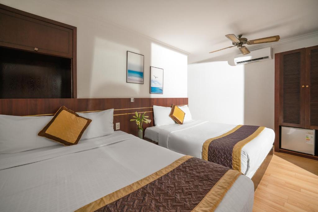 Postel nebo postele na pokoji v ubytování Zenta Sea View Hotel