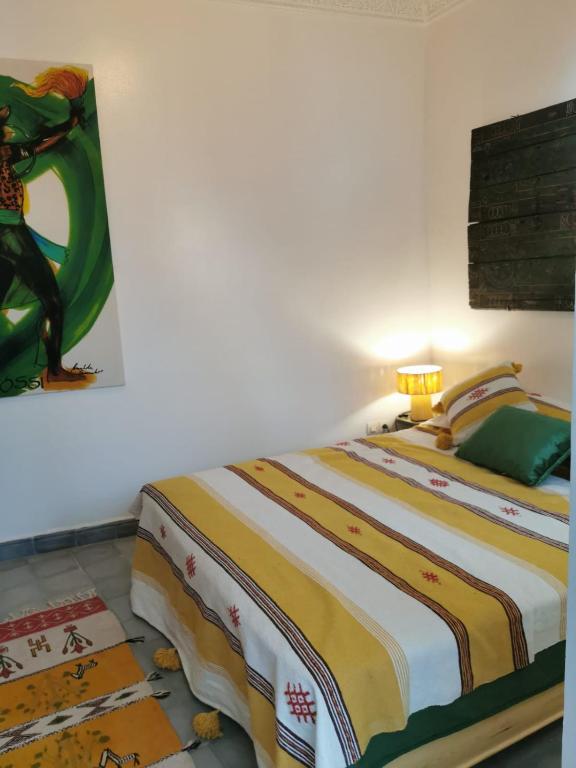 Postel nebo postele na pokoji v ubytování Riad EL BADI