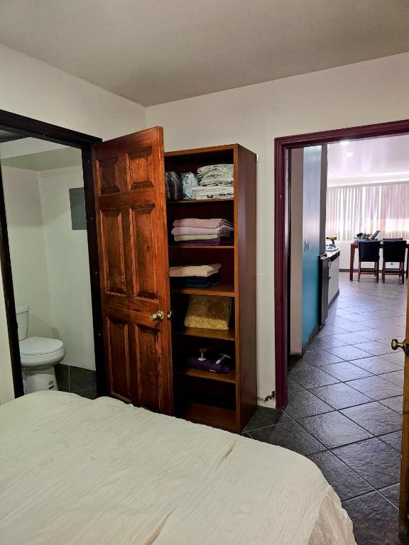 Ένα ή περισσότερα κρεβάτια σε δωμάτιο στο Rosarito Beach House