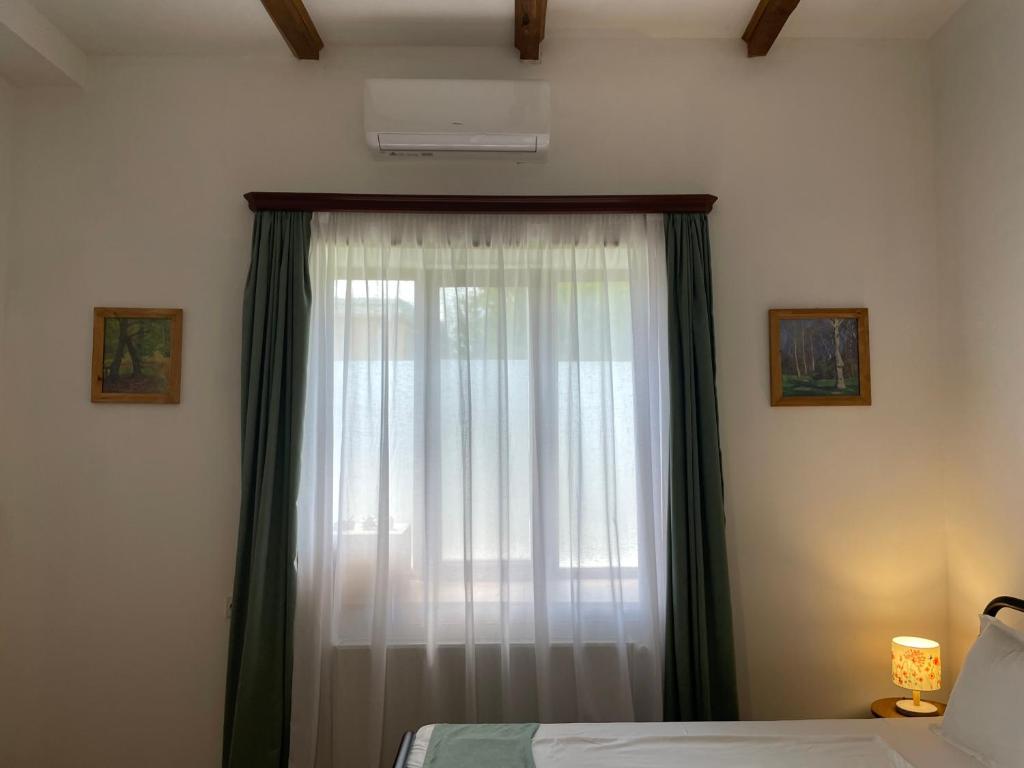 Postel nebo postele na pokoji v ubytování Friendly Home