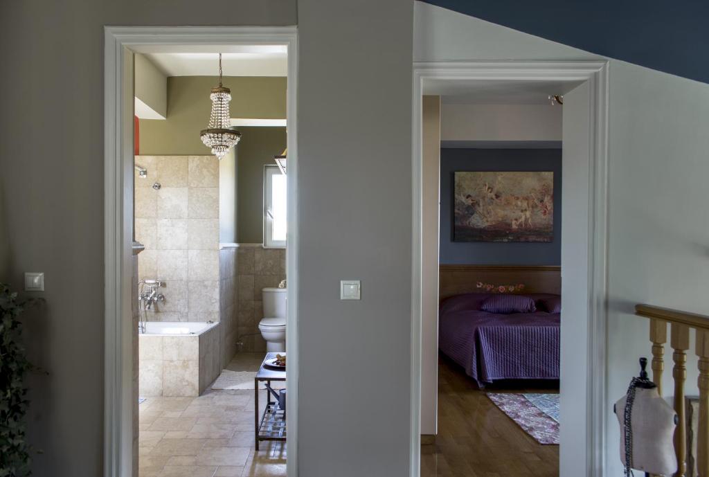 A bed or beds in a room at Villa Pepy