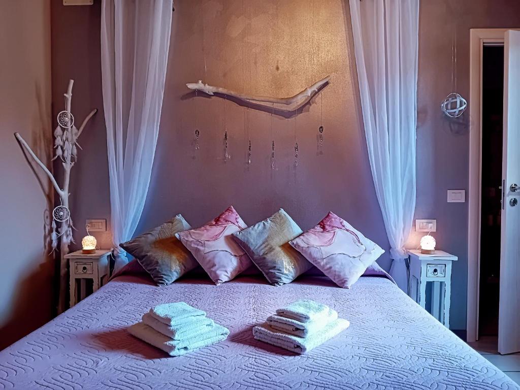 Ένα ή περισσότερα κρεβάτια σε δωμάτιο στο B&B Cristalli Di Luce