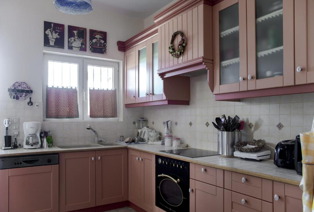 A kitchen or kitchenette at Villa Pepy