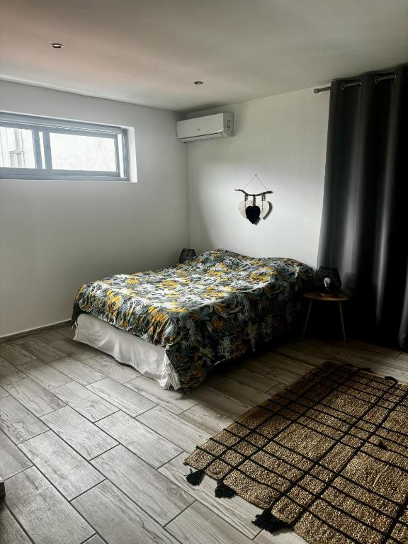Postel nebo postele na pokoji v ubytování Cozy Caze