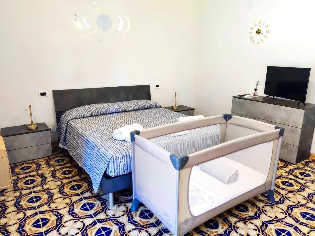 Postel nebo postele na pokoji v ubytování Domus Aura