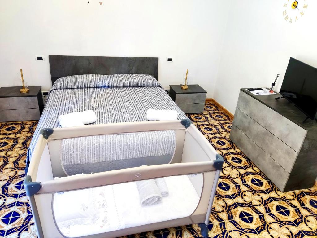 Postel nebo postele na pokoji v ubytování Domus Aura