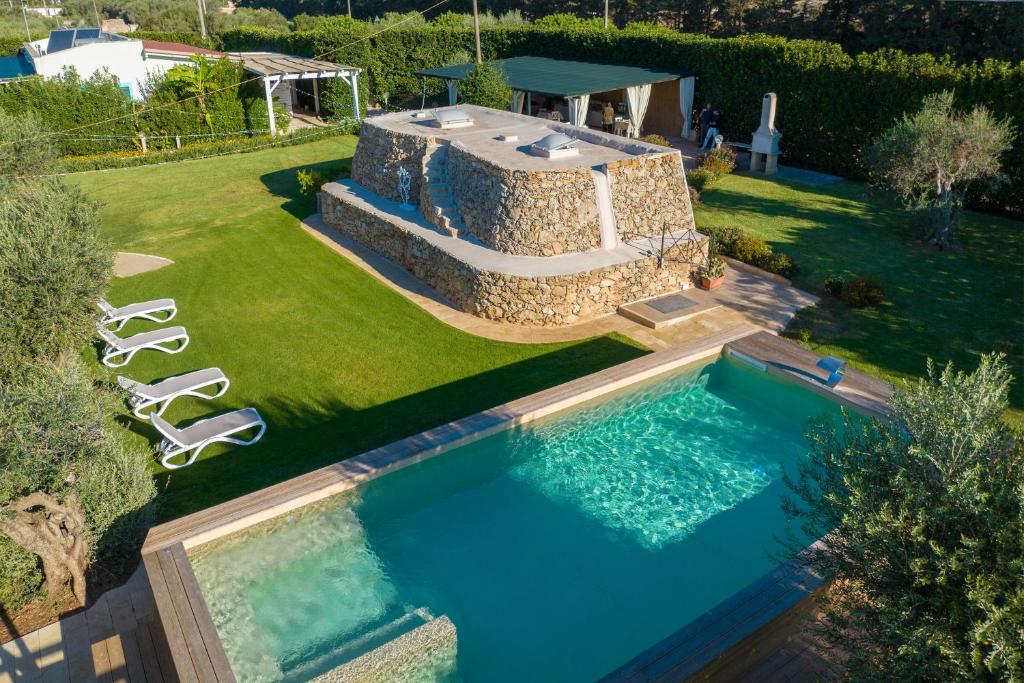 an overhead view of a swimming pool in a yard at Tenuta Solentino in Ugento