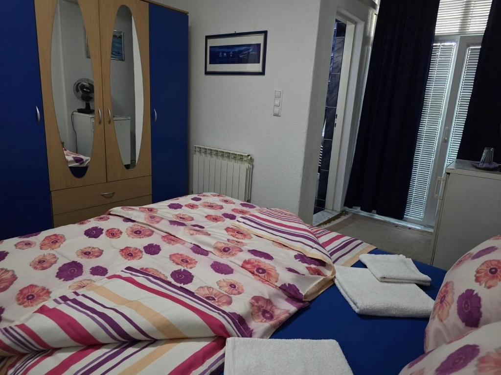 Postel nebo postele na pokoji v ubytování Apartments Stari Točak Sarajevo