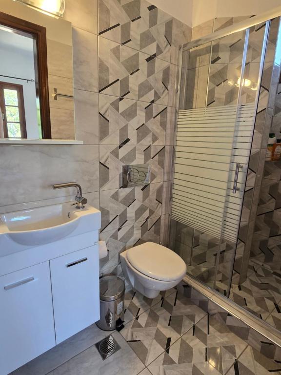 Koupelna v ubytování Karidia Apartments