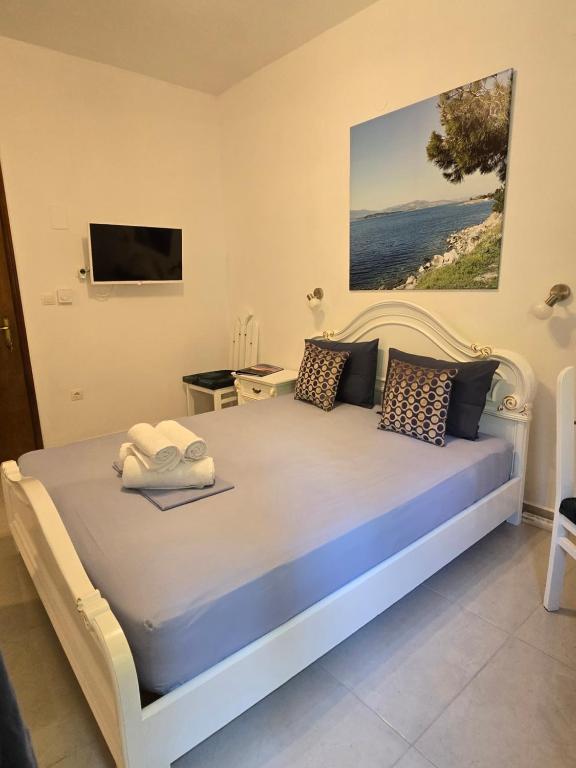 Postel nebo postele na pokoji v ubytování Karidia Apartments