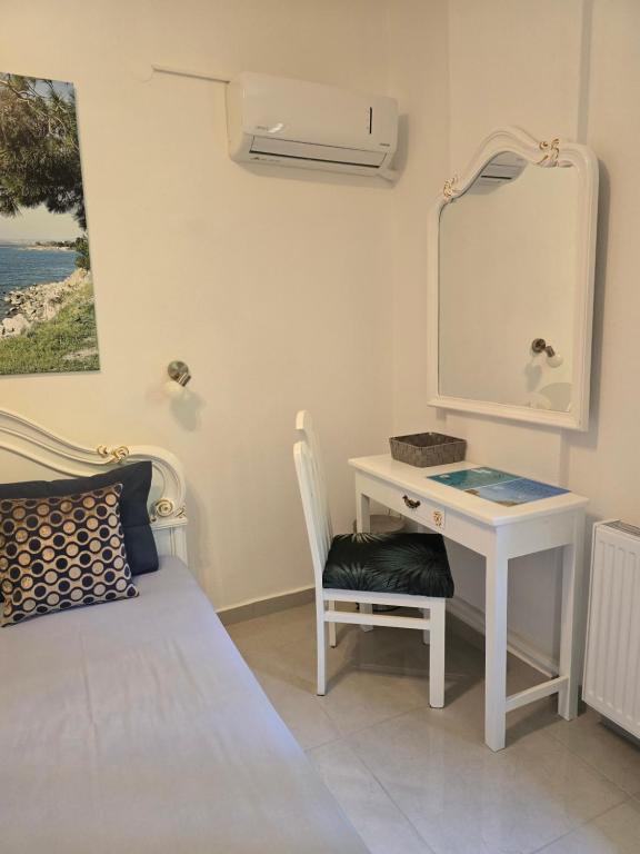 Postel nebo postele na pokoji v ubytování Karidia Apartments