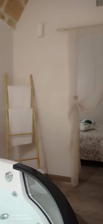 Postel nebo postele na pokoji v ubytování Suite Maison Rouge