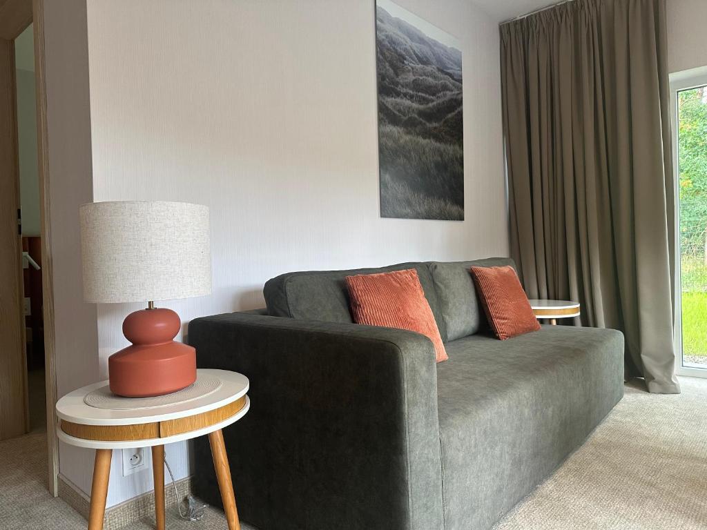 Posezení v ubytování Apartamenty Joy Me Łukęcin