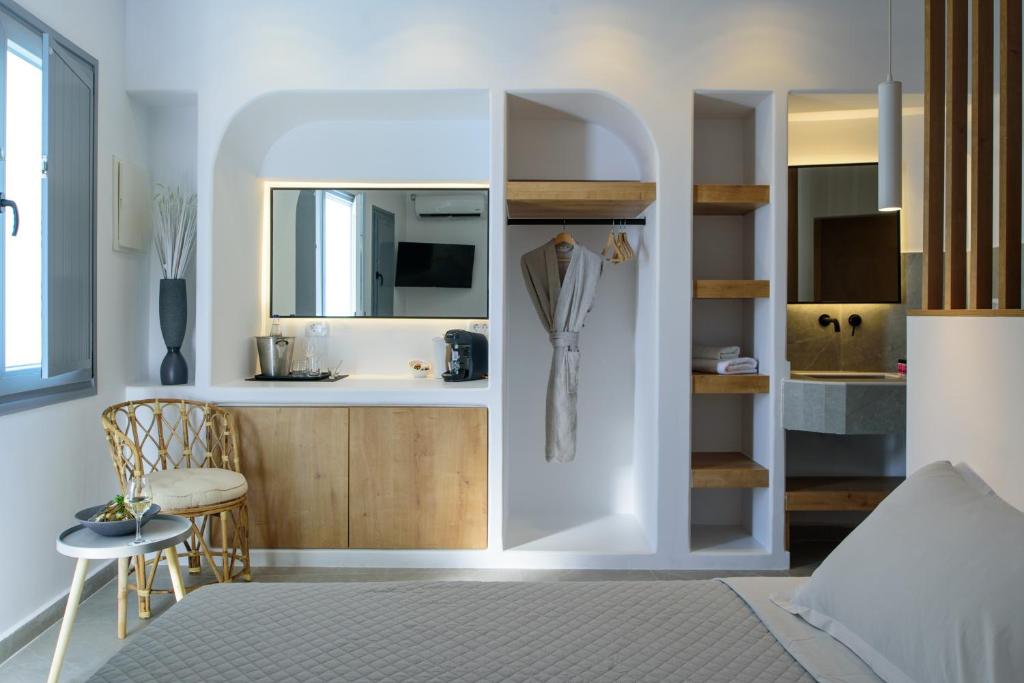 Postel nebo postele na pokoji v ubytování Elia Caldera Suites