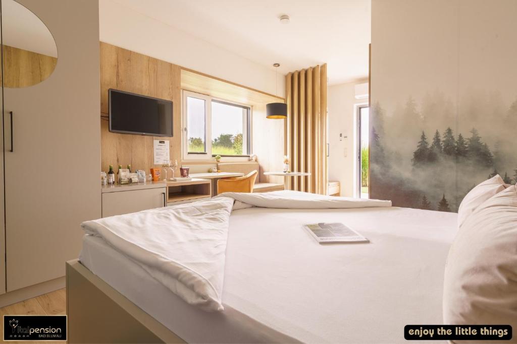 TV a/nebo společenská místnost v ubytování Vitalpension Bad Blumau - ADULTS ONLY