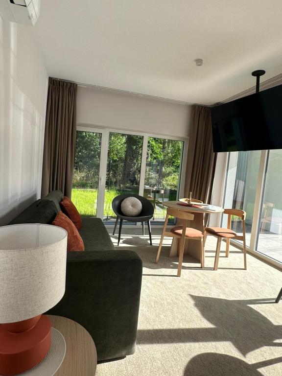 Posezení v ubytování Apartamenty Joy Me Łukęcin