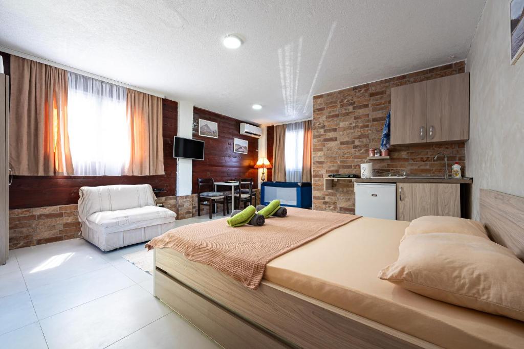 Postel nebo postele na pokoji v ubytování Apartments Obala