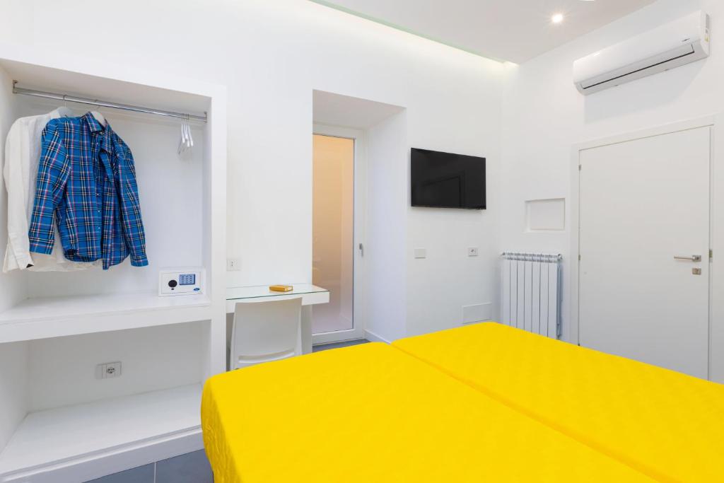 Postel nebo postele na pokoji v ubytování Maison Rosetta