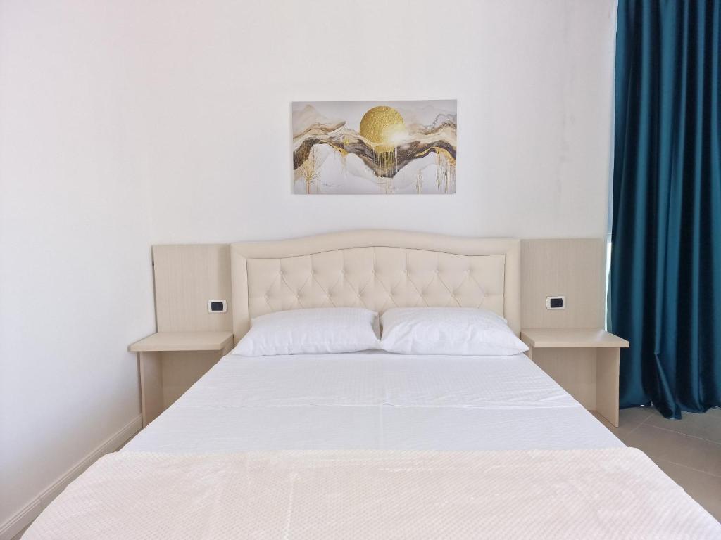 Postel nebo postele na pokoji v ubytování Erald Guest House