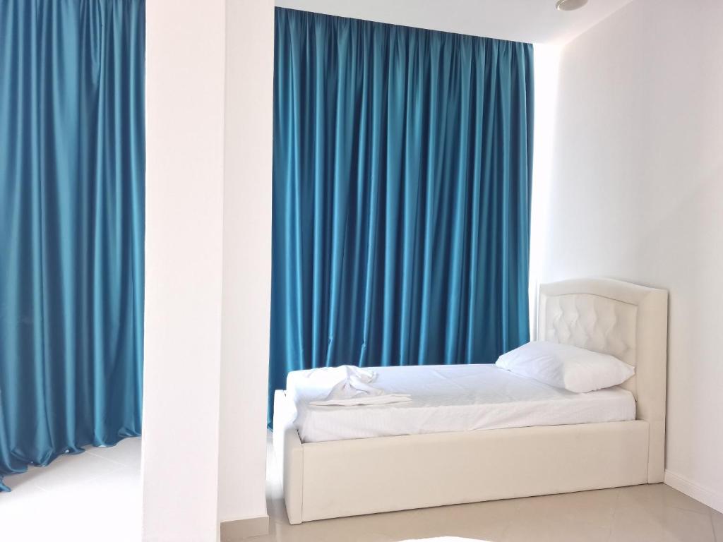 Postel nebo postele na pokoji v ubytování Erald Guest House