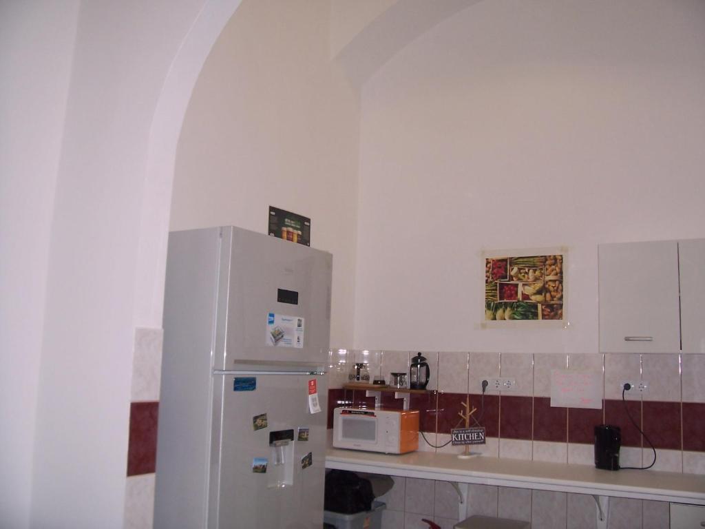 Kuchyň nebo kuchyňský kout v ubytování A & E Apartment Budapest