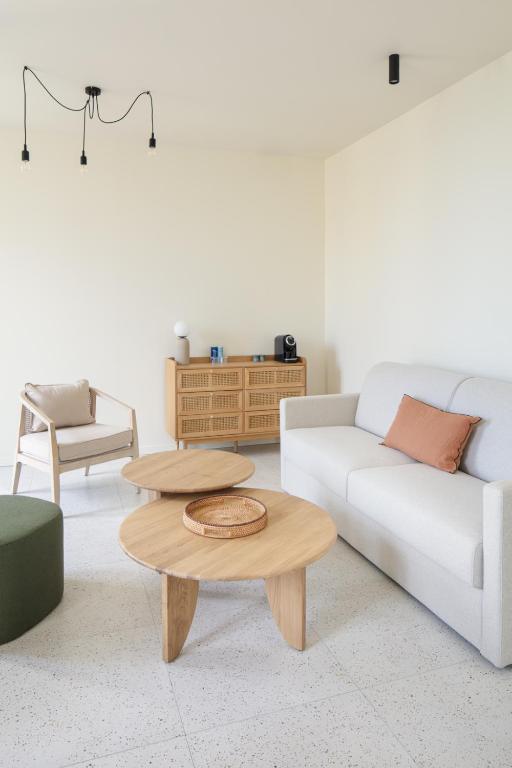 Posezení v ubytování Hôtel La Suite