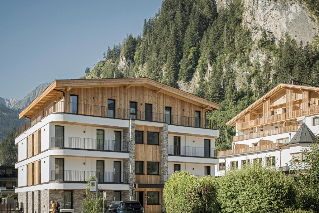 Nespecifikovaný výhled na hory nebo výhled na hory při pohledu z aparthotelu