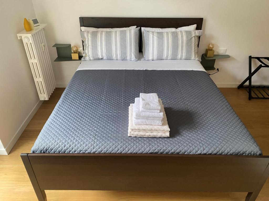 Ένα ή περισσότερα κρεβάτια σε δωμάτιο στο Magie Milano