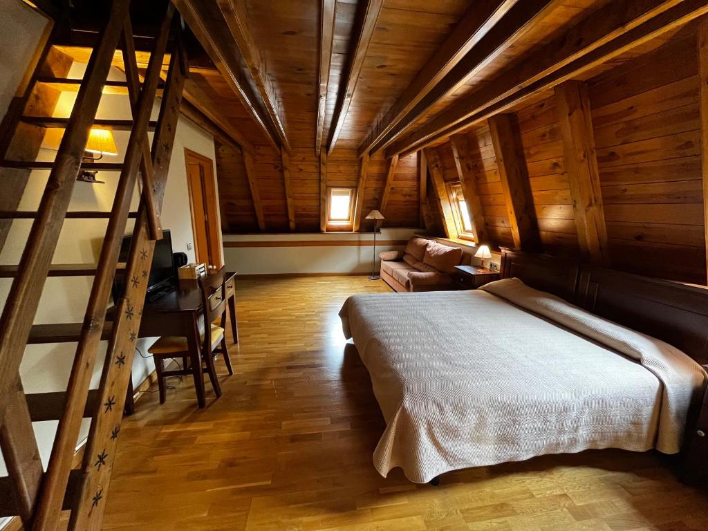 Postel nebo postele na pokoji v ubytování Hotel Ço De Pierra