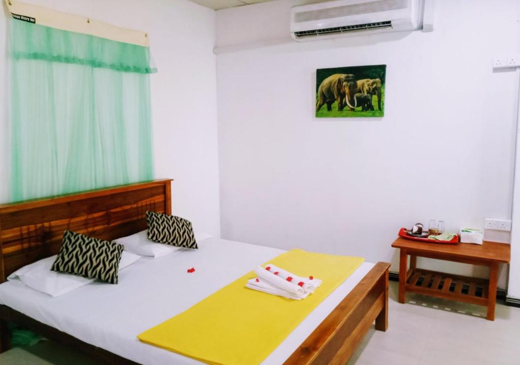 Postel nebo postele na pokoji v ubytování Jm Resort