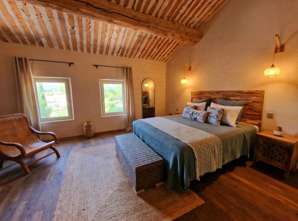 Postel nebo postele na pokoji v ubytování Bastide des 7 Sœurs