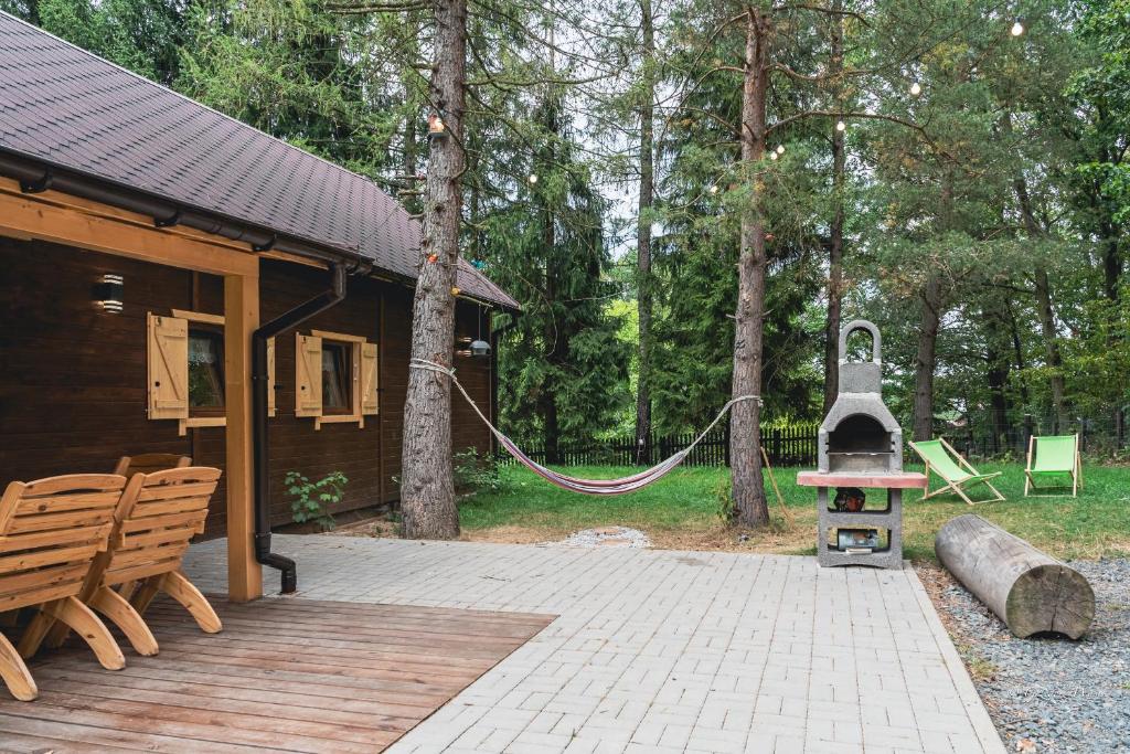 Zahrada ubytování Domek Pan Modrzew - Slow - Hamaki - Chill - ogrodzony teren Pet Friendly