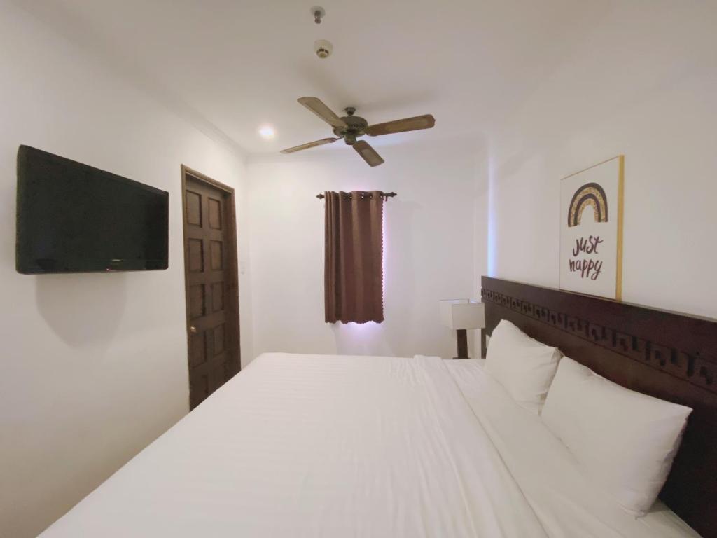 Postel nebo postele na pokoji v ubytování Zenta Sea View Hotel
