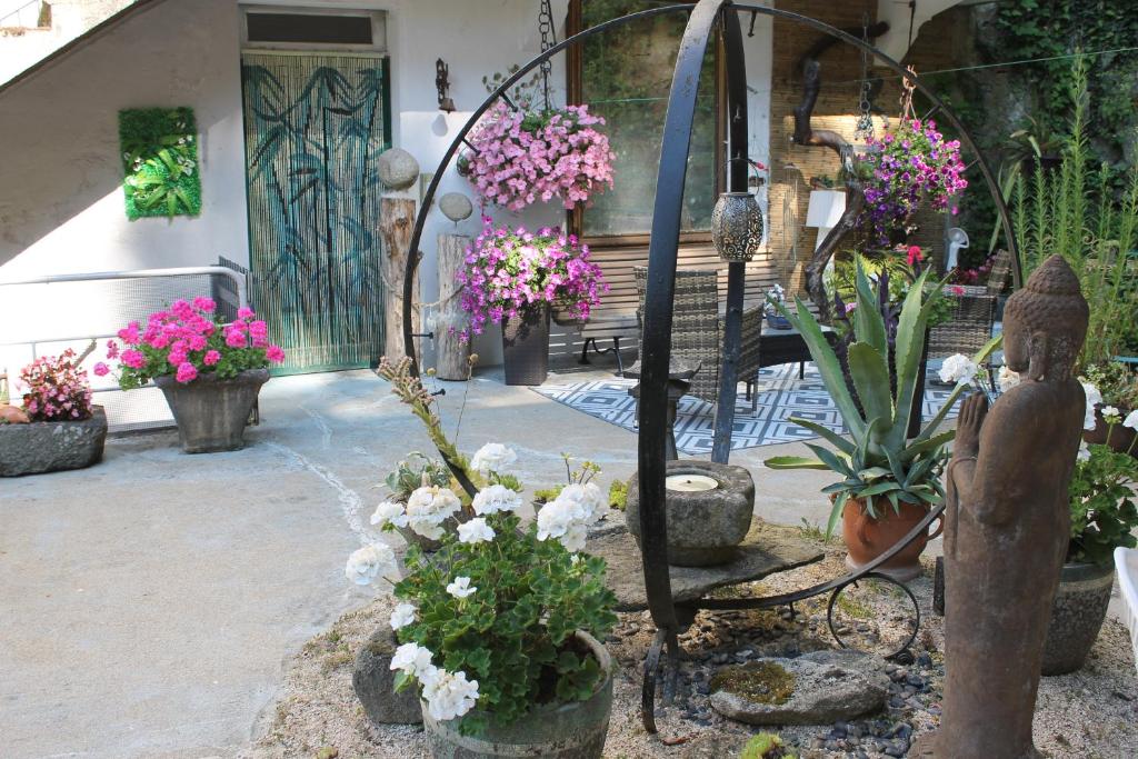 Vonkajšia záhrada v ubytovaní Studio Malou, cuisine, salle d'eau, terrasse amenagée