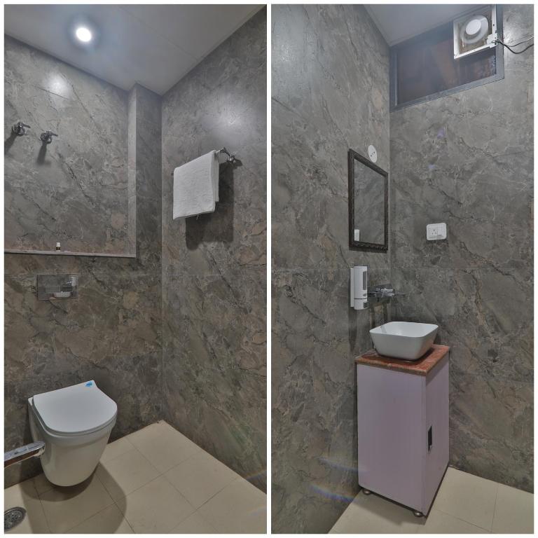 Vannituba majutusasutuses Hotel Ramayan Suites Ayodhya Free Pickup From Ayodhya Railway Station ಉಚಿತ ಪಿಕಪ್ ,ఉచిత పికప్ ,இலவச,பிக்அப்
