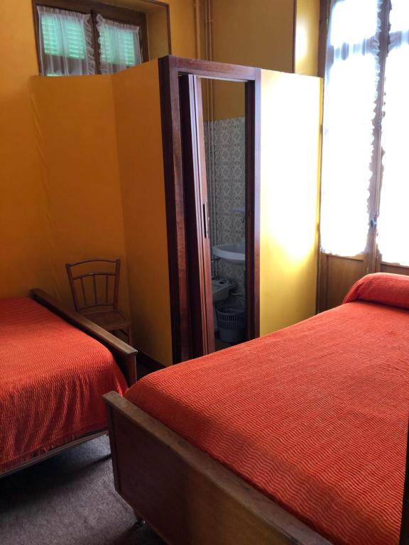 Postel nebo postele na pokoji v ubytování Hotel Villa Plaisance