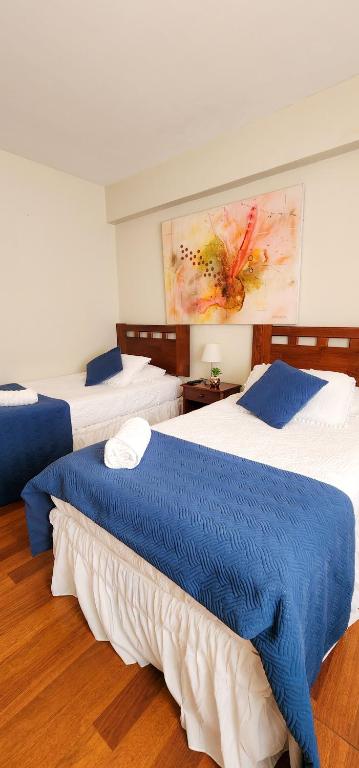 Postel nebo postele na pokoji v ubytování hostal andino