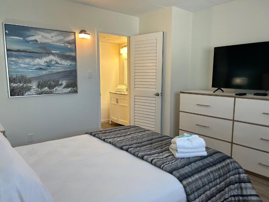 Postel nebo postele na pokoji v ubytování Esplanade Suites - A Sundance Vacations Property