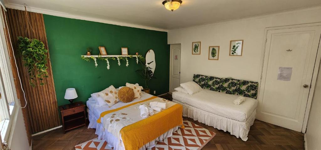 Postel nebo postele na pokoji v ubytování hostal andino