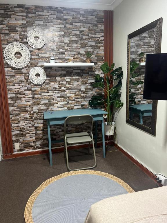 TV a/nebo společenská místnost v ubytování hostal andino