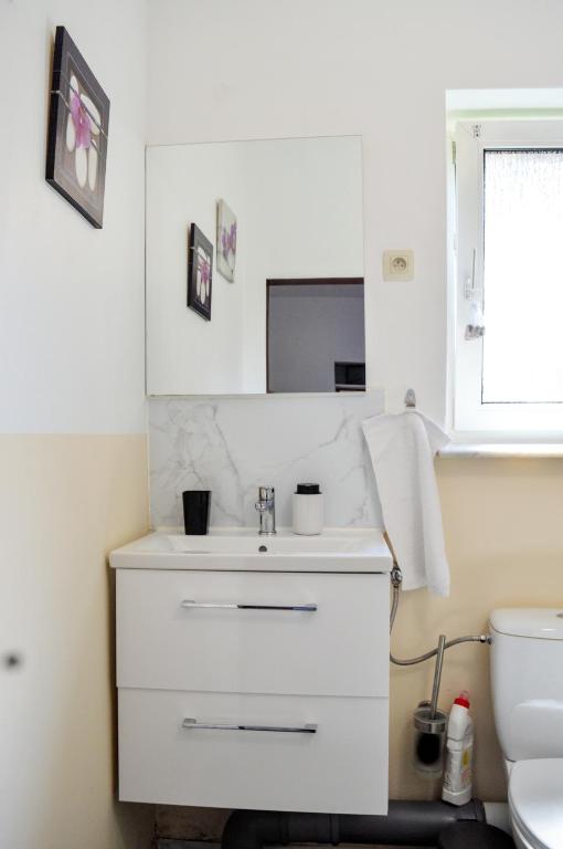 Koupelna v ubytování Logement Gare