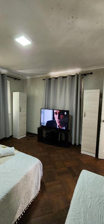 TV a/nebo společenská místnost v ubytování hostal andino