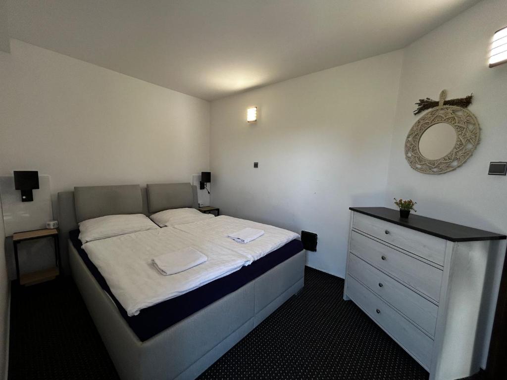 Postel nebo postele na pokoji v ubytování Apartmán Hugo