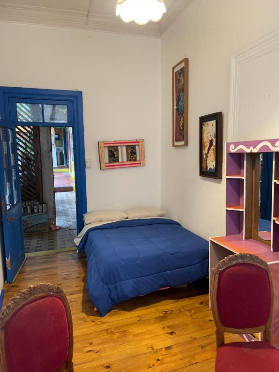 Uma cama ou camas num quarto em Art Hostel Casa Chaman