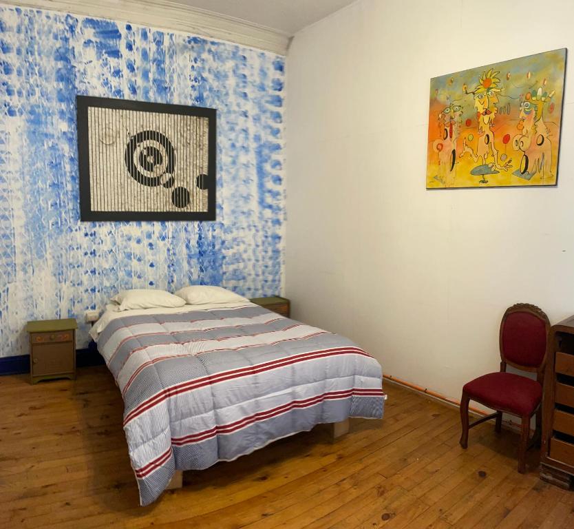 Uma cama ou camas num quarto em Art Hostel Casa Chaman
