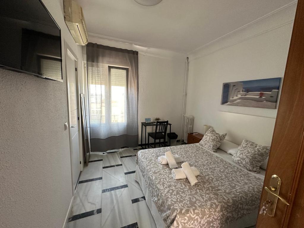 TV a/nebo společenská místnost v ubytování Hostal Arrate