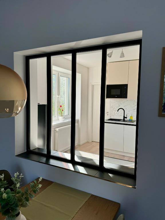 Kuchyň nebo kuchyňský kout v ubytování Apartment ZOi