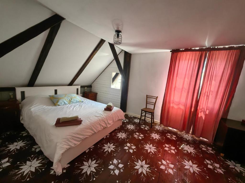 Postel nebo postele na pokoji v ubytování Hiša Hortenzija Luče