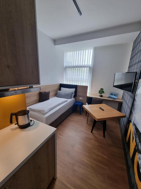 my MINGA Airport serviced Apartments - Einzelzimmer